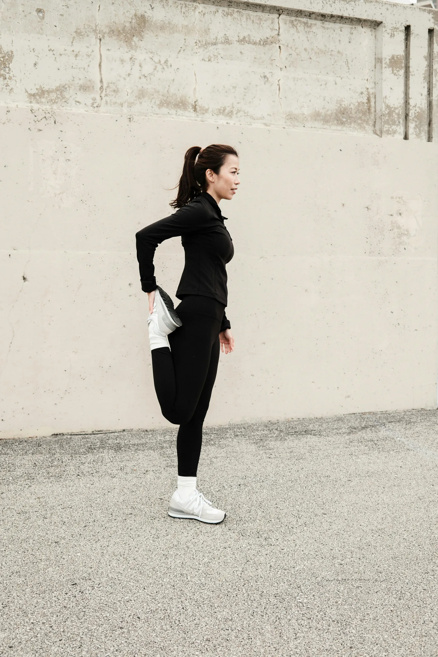 Woman warming up and stretching before exercise